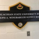 sign for the ROTC supply room dedicated to Joe Winbarger